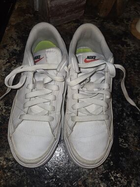 Nike White Low-Top Sneakers with Neon Green Insoles and Red Swoosh